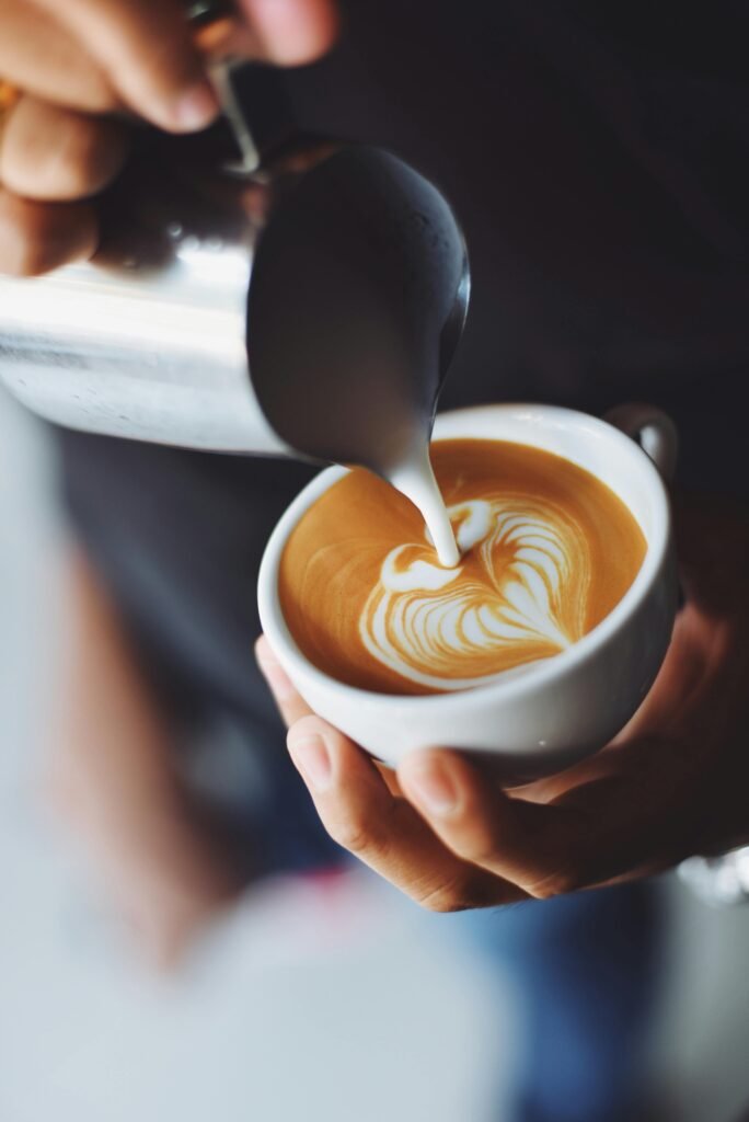 pexels-photo-302896-302896 Woman Pouring Cappuccino